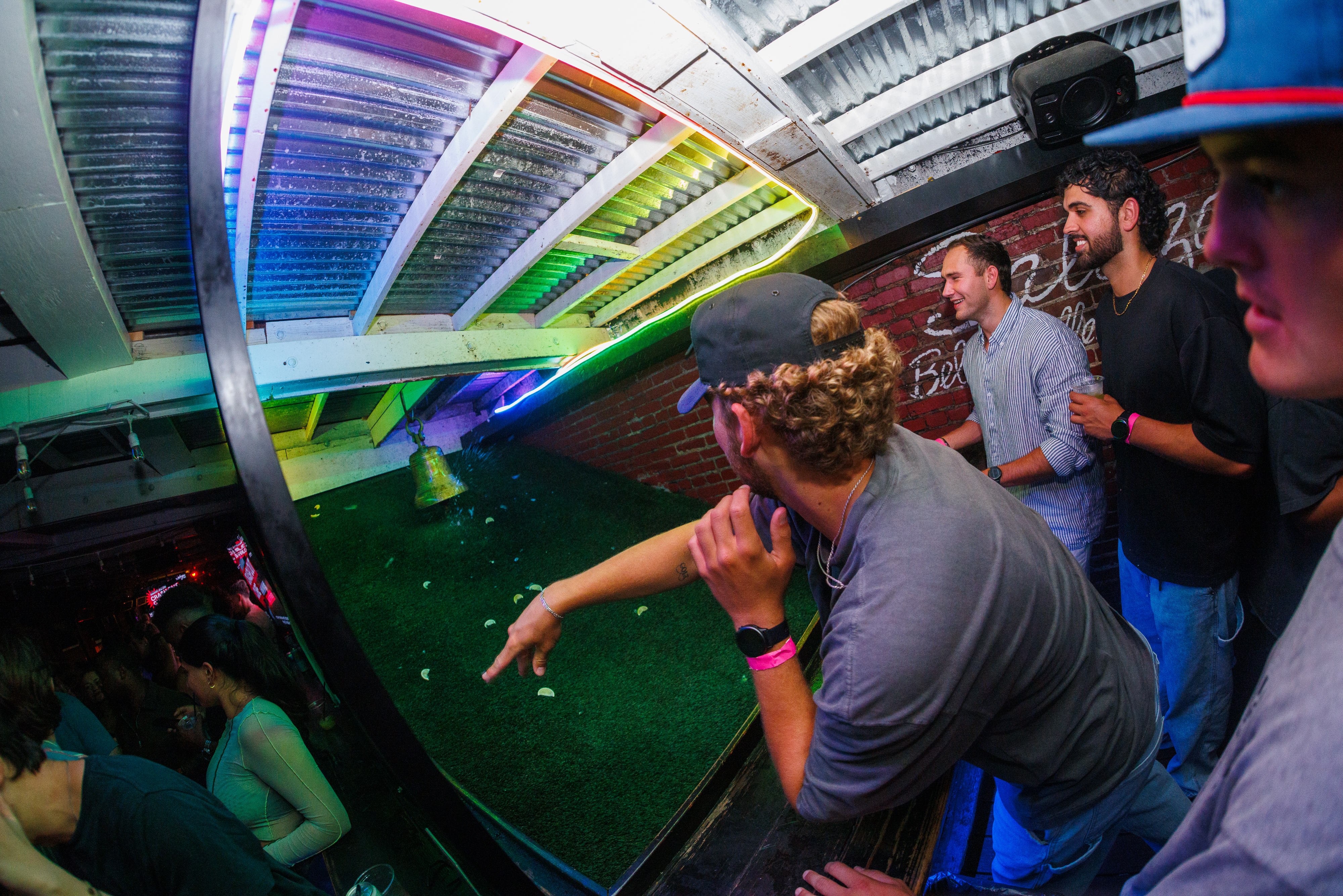a man carrying a surf board
