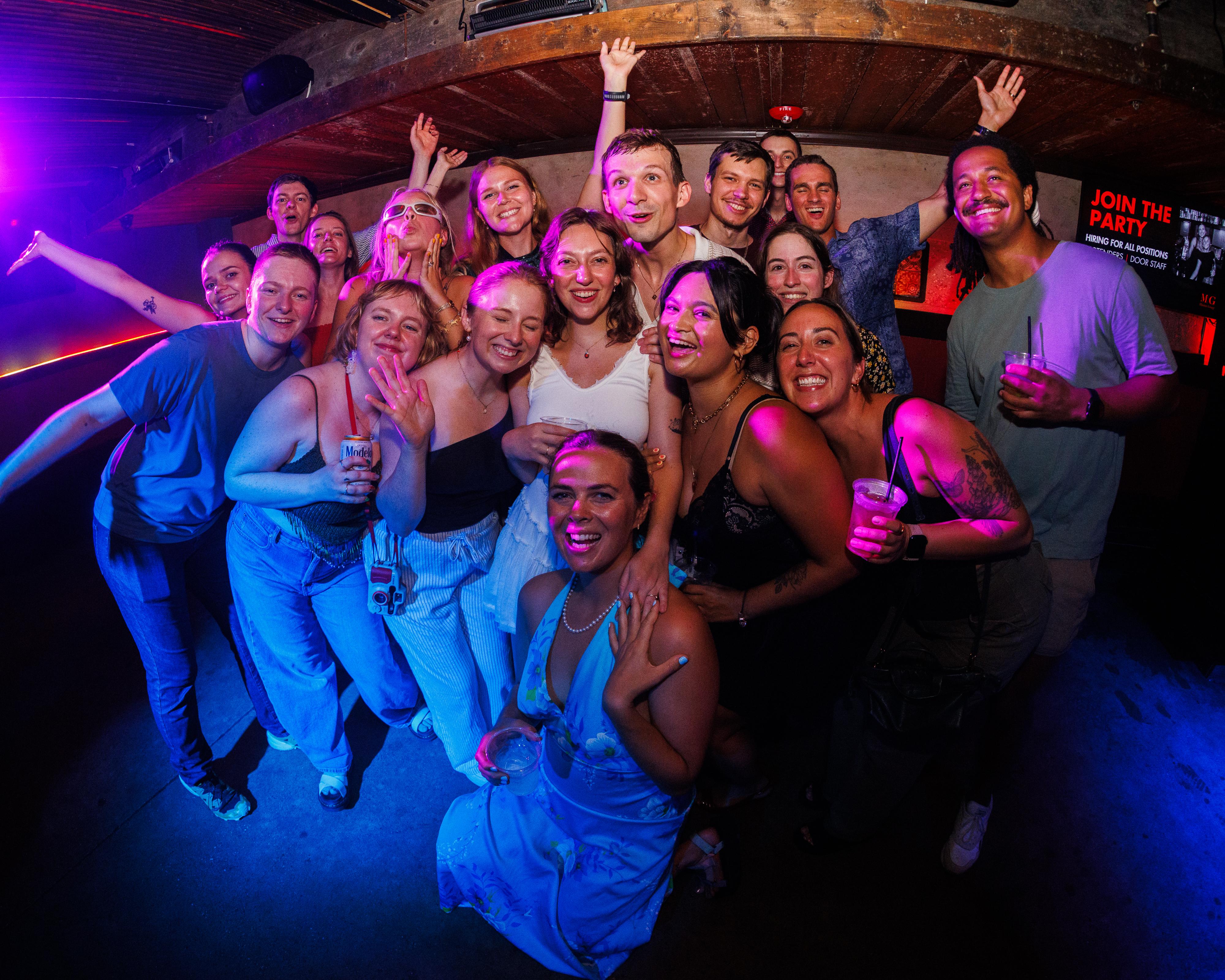 Natascha Kampusch et al. standing on a stage posing for the camera