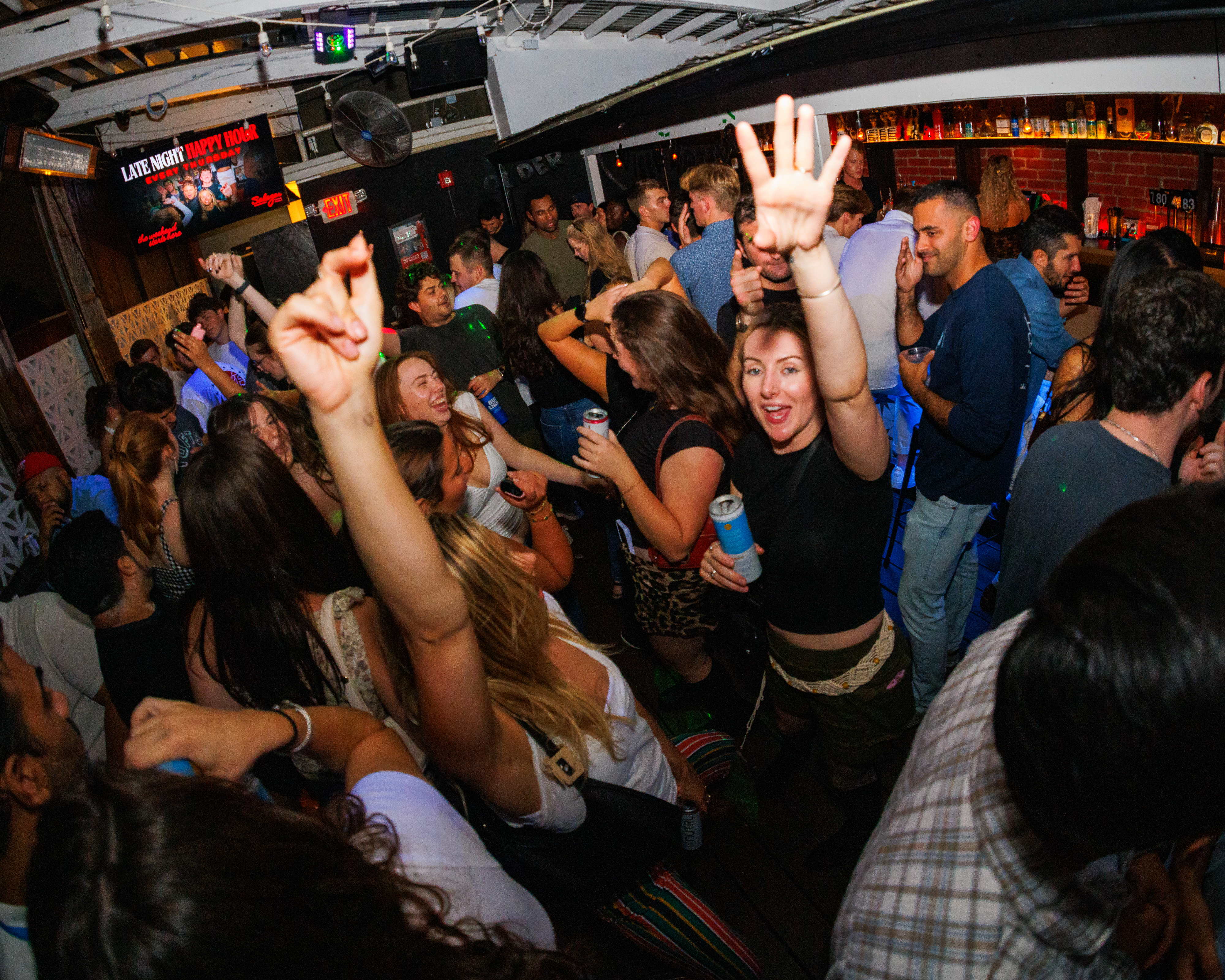 a group of people standing in front of a crowd