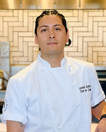 a man in a chef's uniform