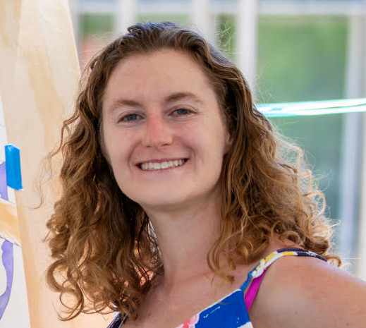 a woman smiling at camera