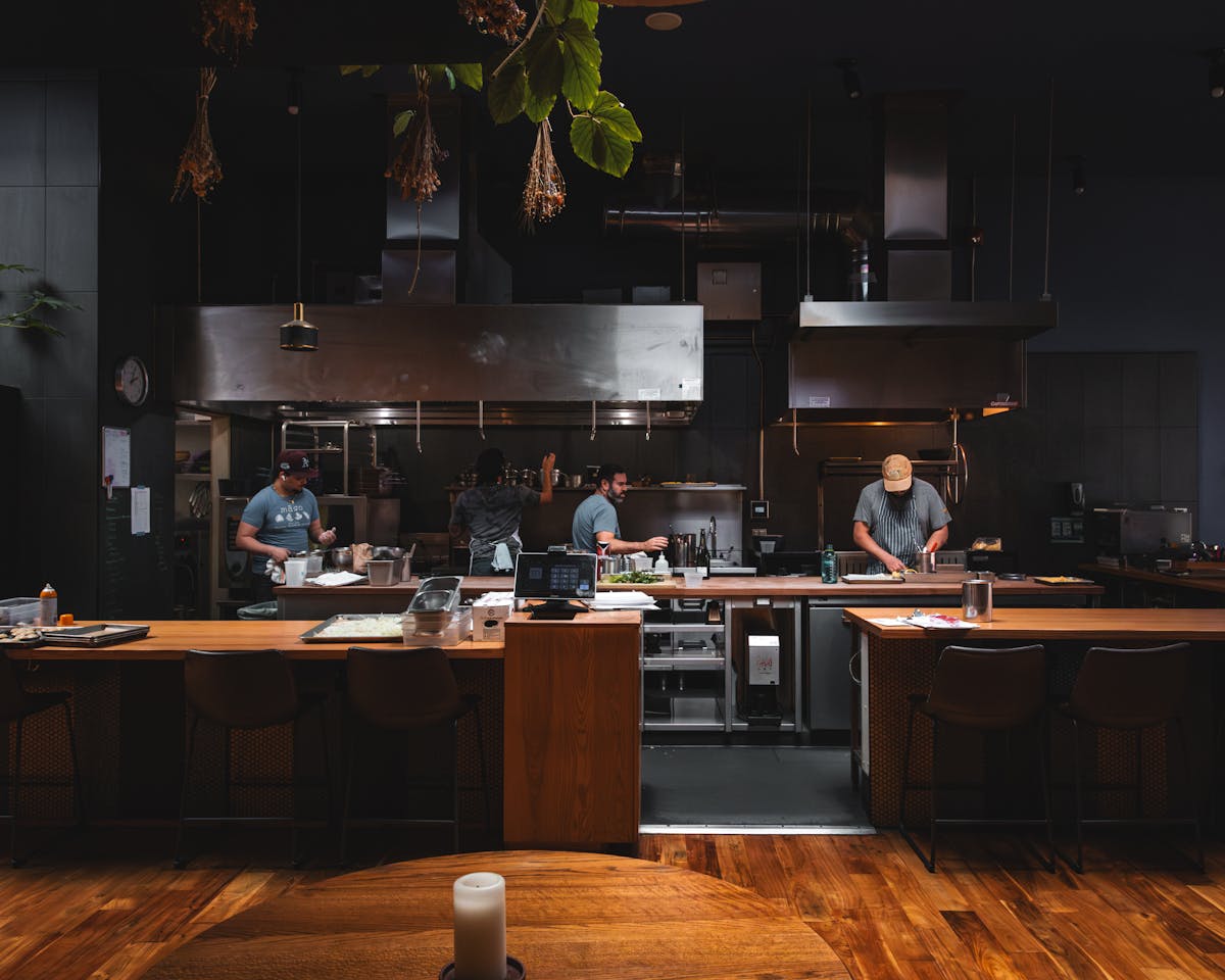 a kitchen with a table in a room