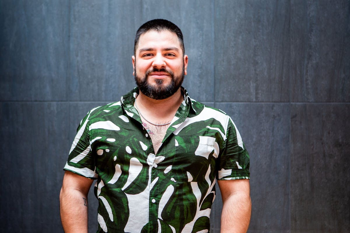 a man in a green shirt