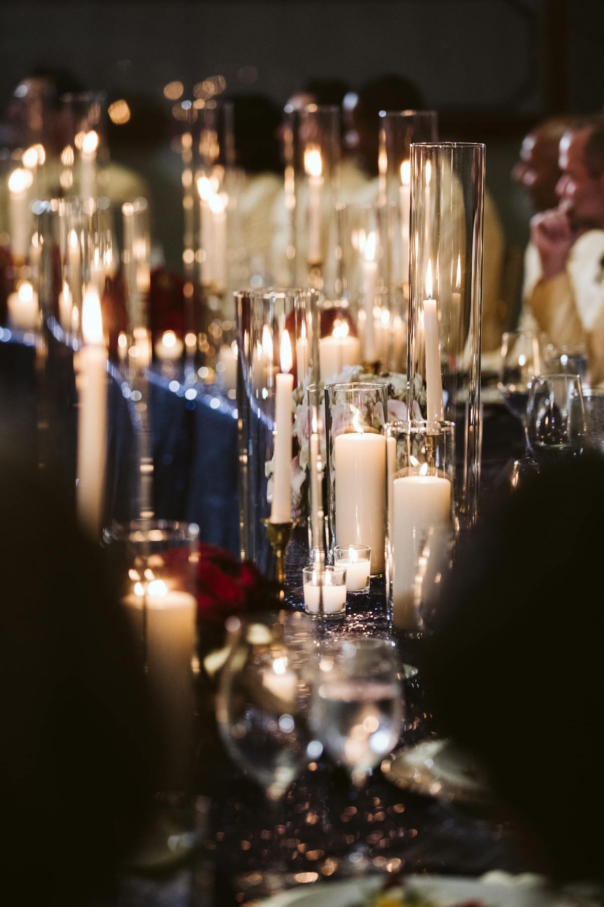 a row of wine glasses sitting on a table