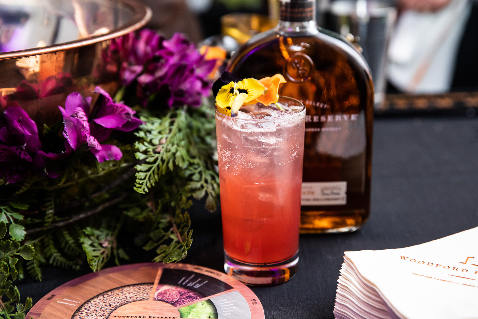 a close up of a glass of beer on a table