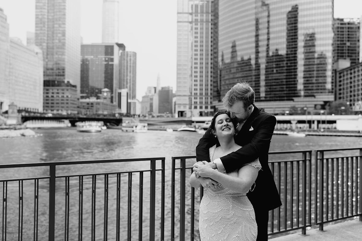 a person standing in front of a fence