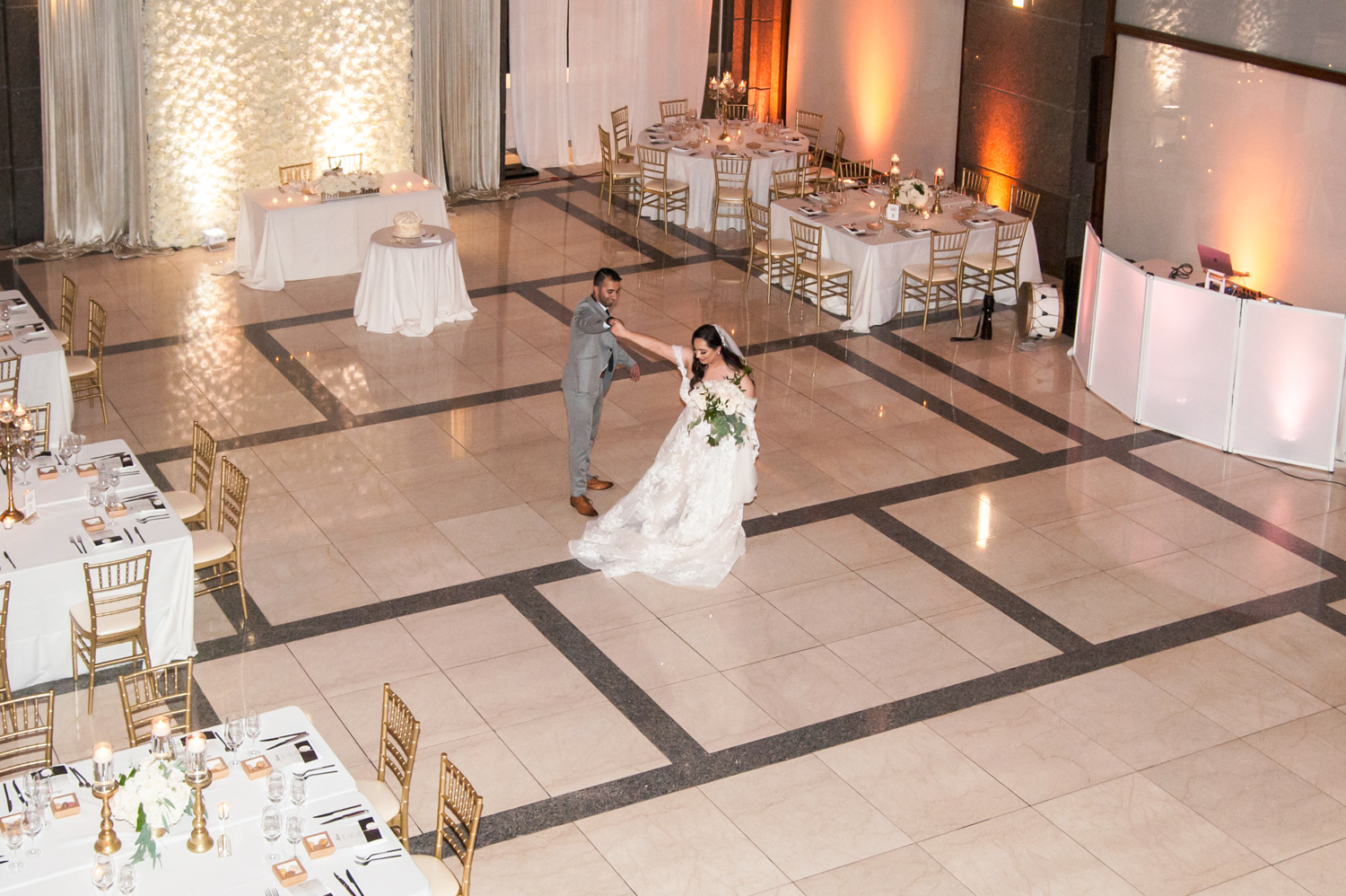 a glass of wine next to a fireplace