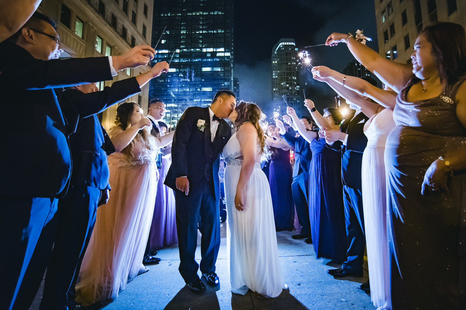 a group of people playing instruments and performing on a stage