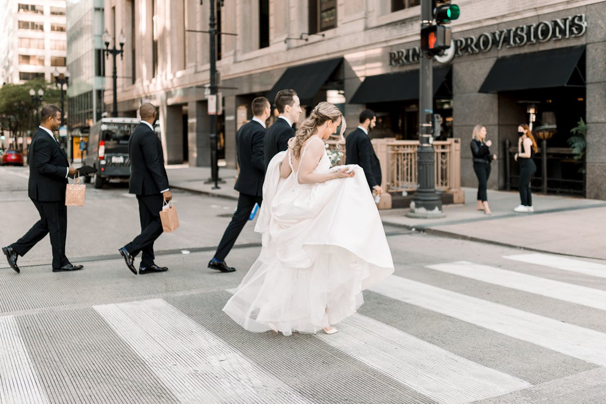 Bride crossing the street downtown Chicago