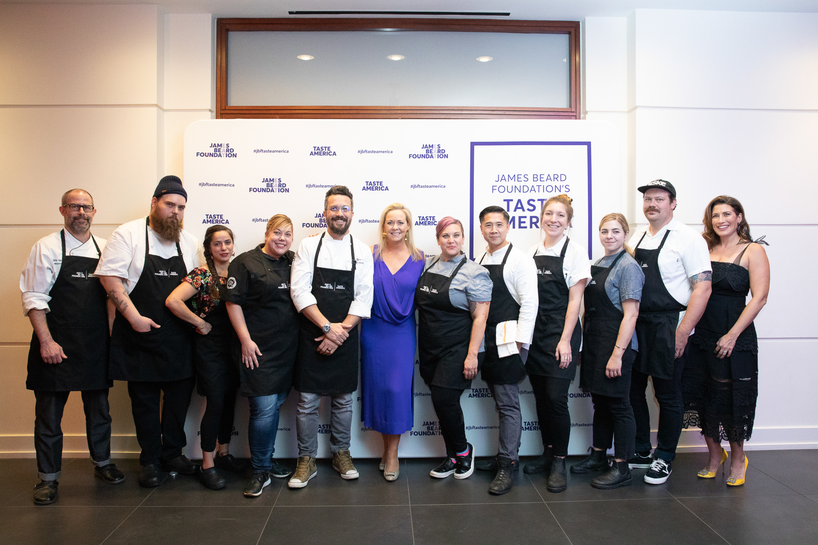 a group of people posing for a photo