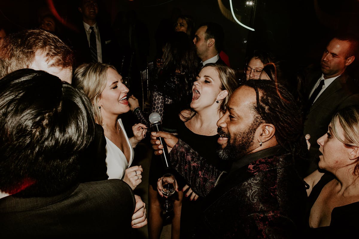 a group of people in a dark room