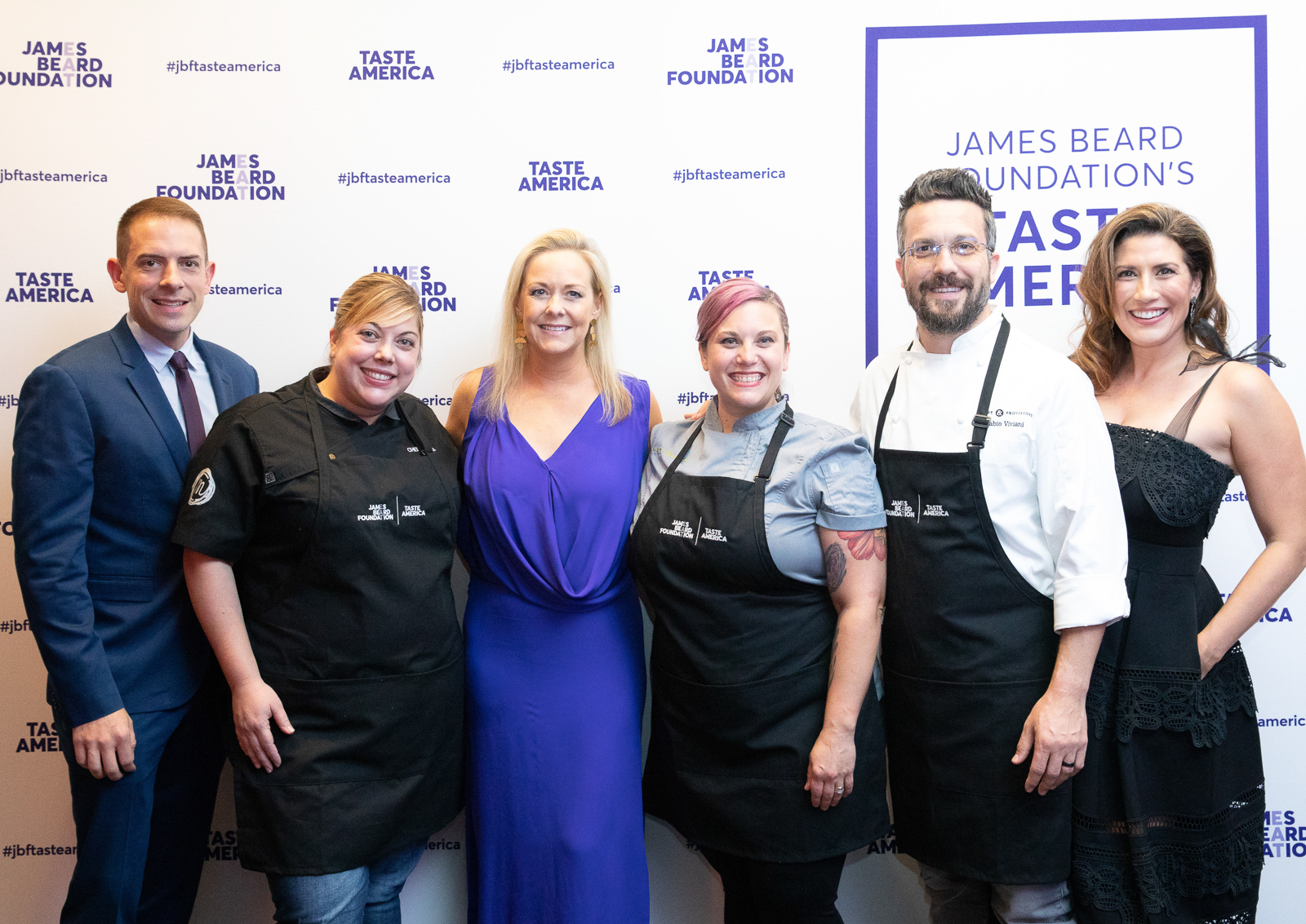 Kris Moon et al. posing for a photo