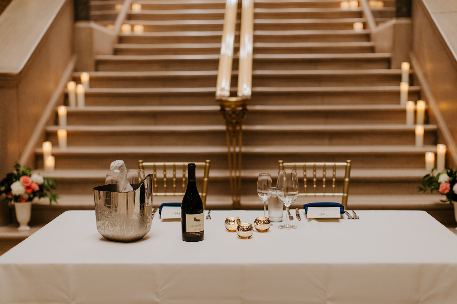 a glass of wine on a table