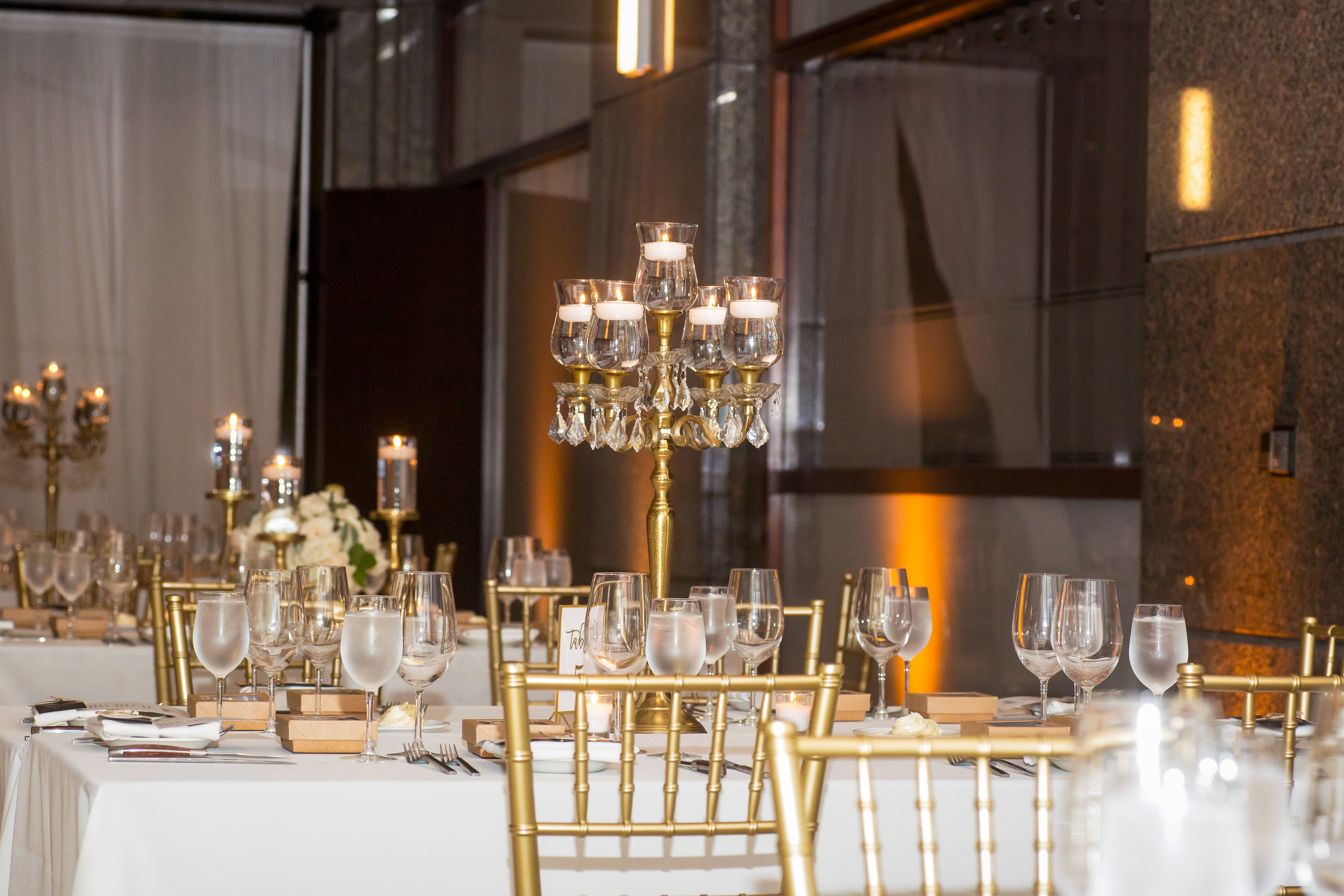 a dining table with wine glasses