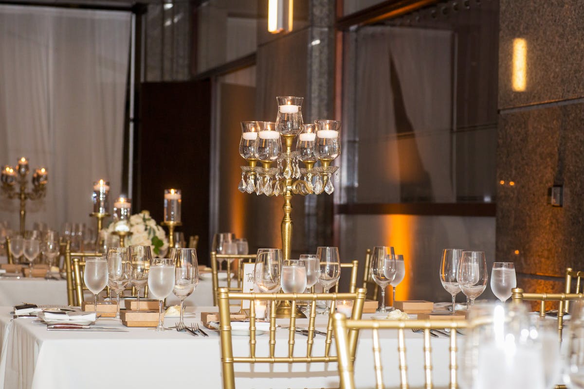 a dining table with wine glasses