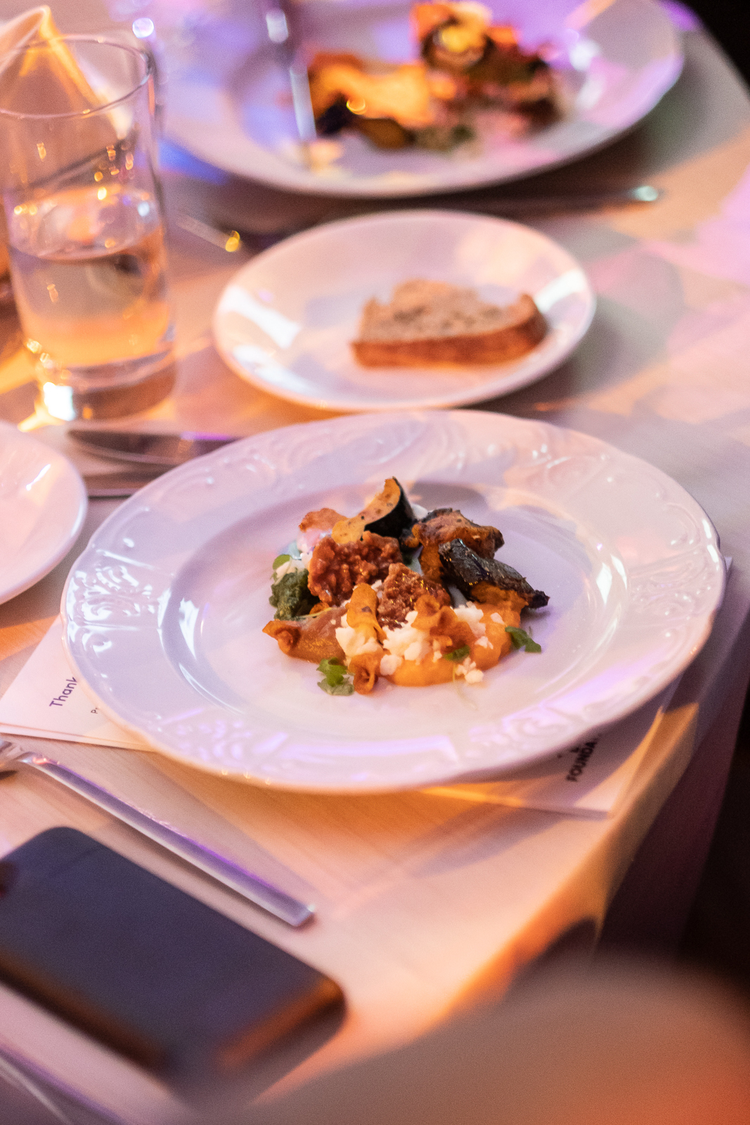 a table topped with plates of food on a plate