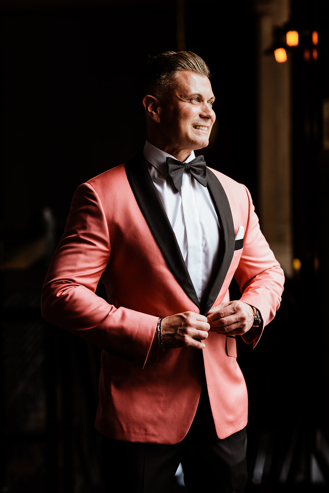 groom and bride posing for the camera