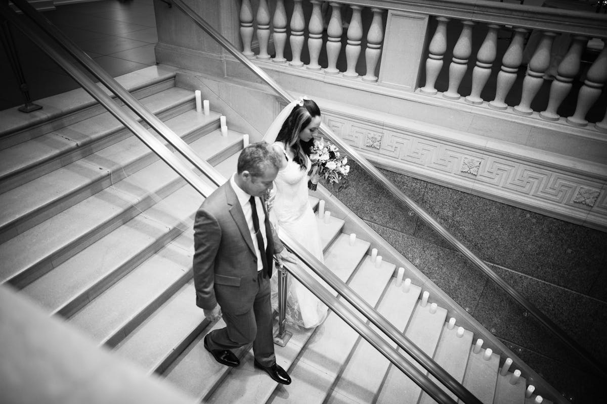 a person walking down a railing