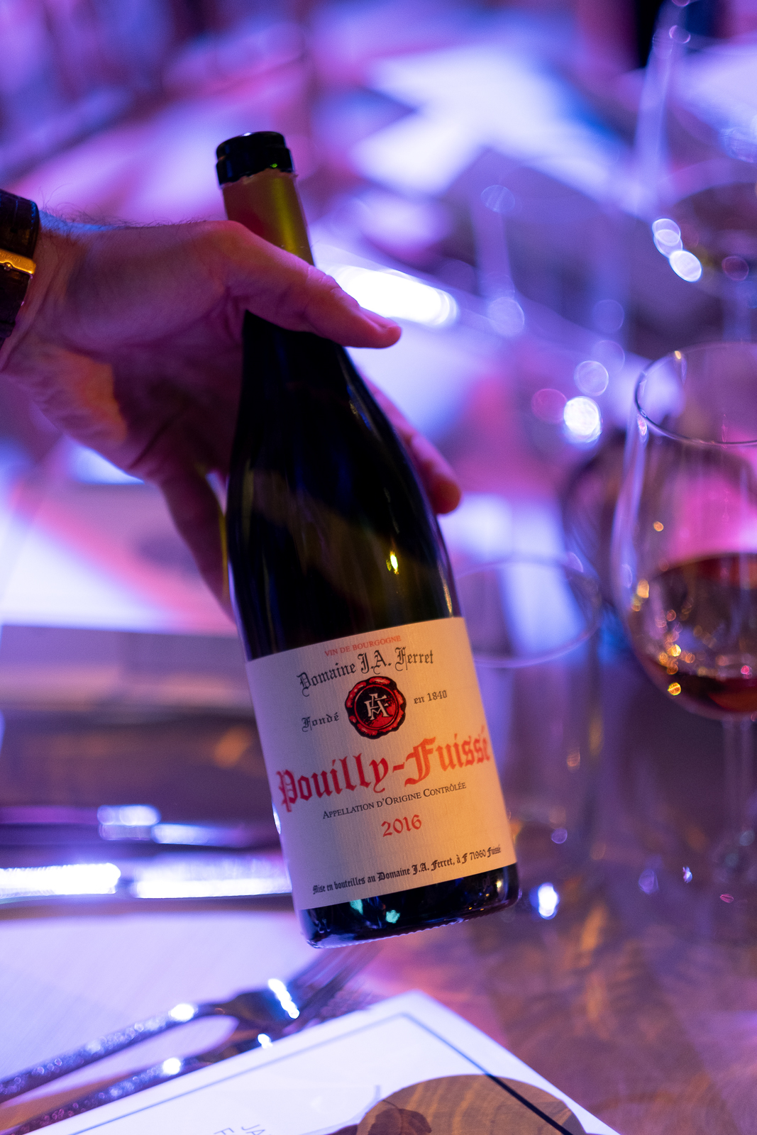 a bottle of wine on a table