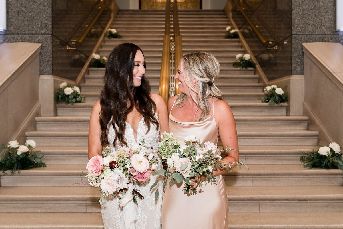 Bride & Maid of honor photo at A Timeless Classic Historical Chicago Wedding Venue