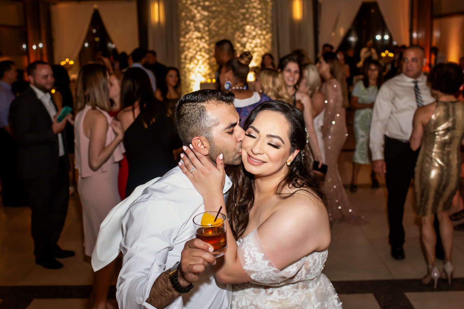 a group of people holding wine glasses