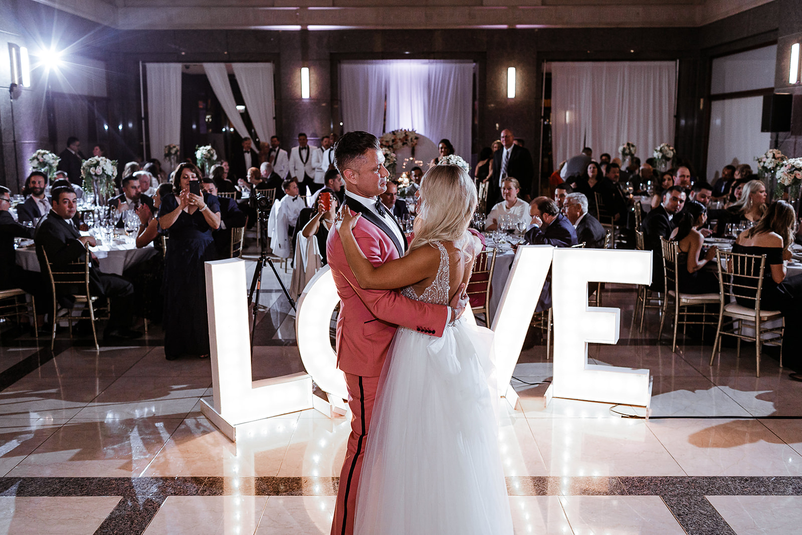 a crowd of people in a room