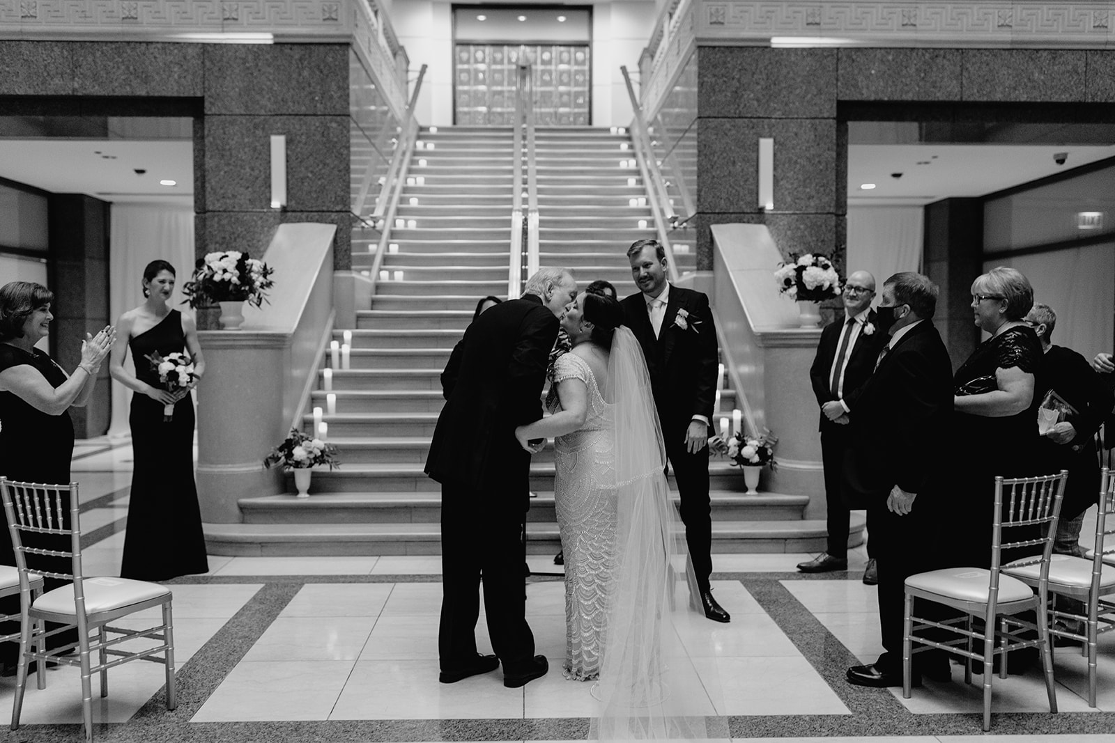 a group of people standing in front of a building