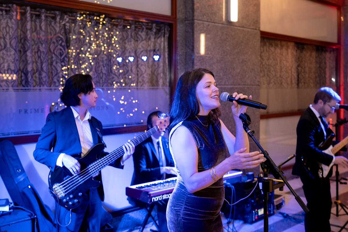 Chicago Blues Band Performing at a James Bond Casino Themed Holiday Party at a Large Historical Downtown Chicago Venue