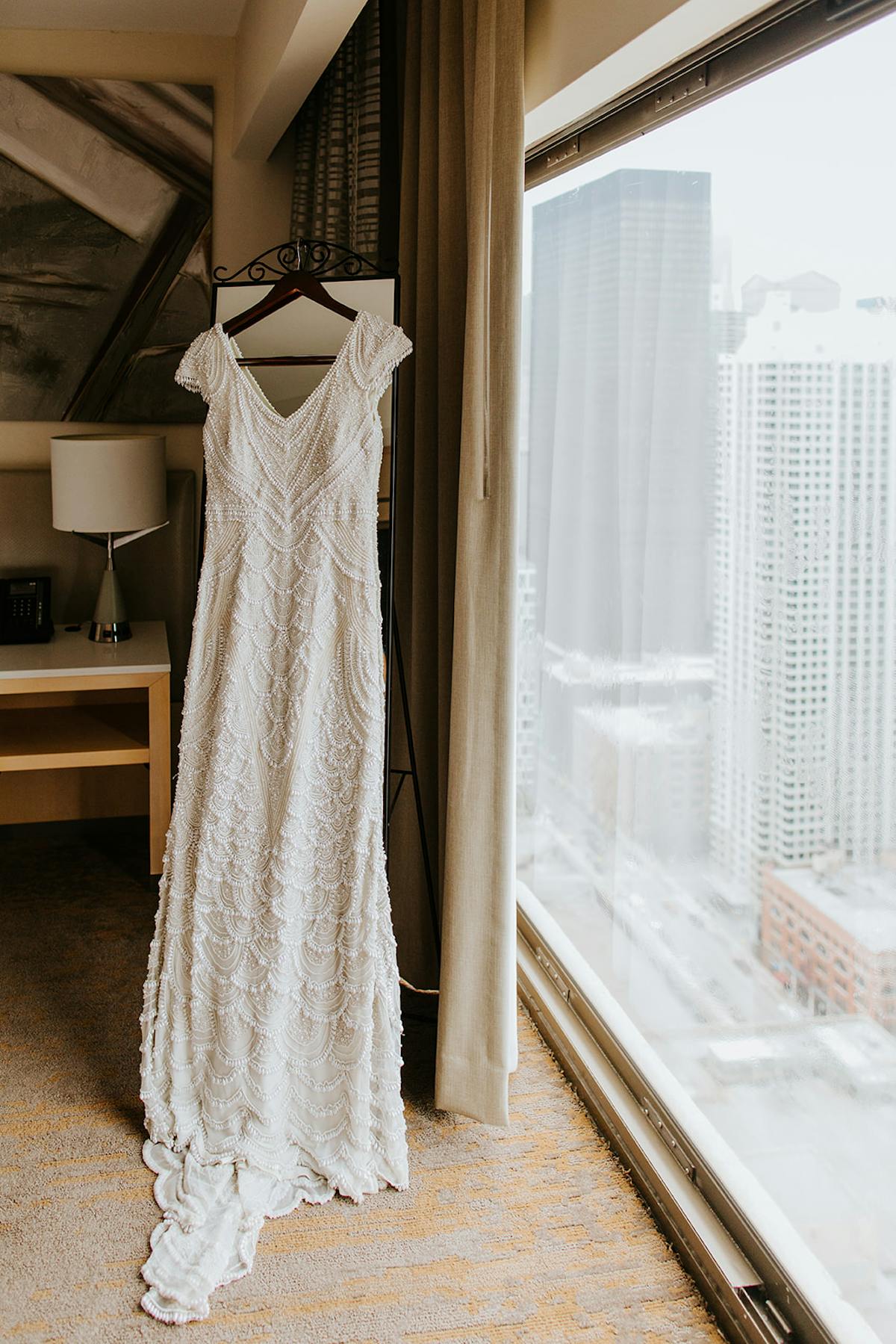 a bedroom with a large window