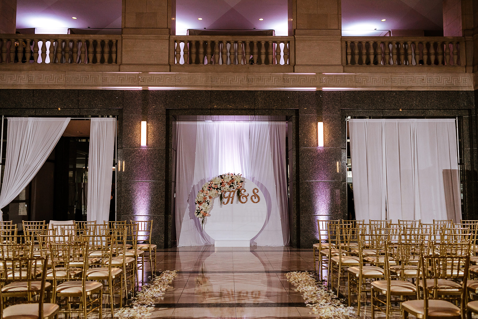 a group of people standing in front of a building