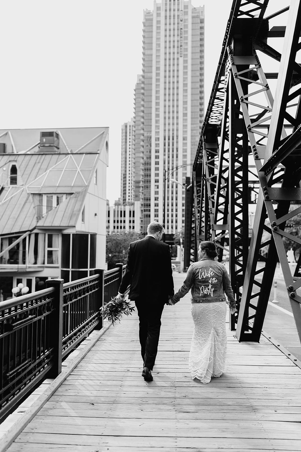 a person walking across a bridge