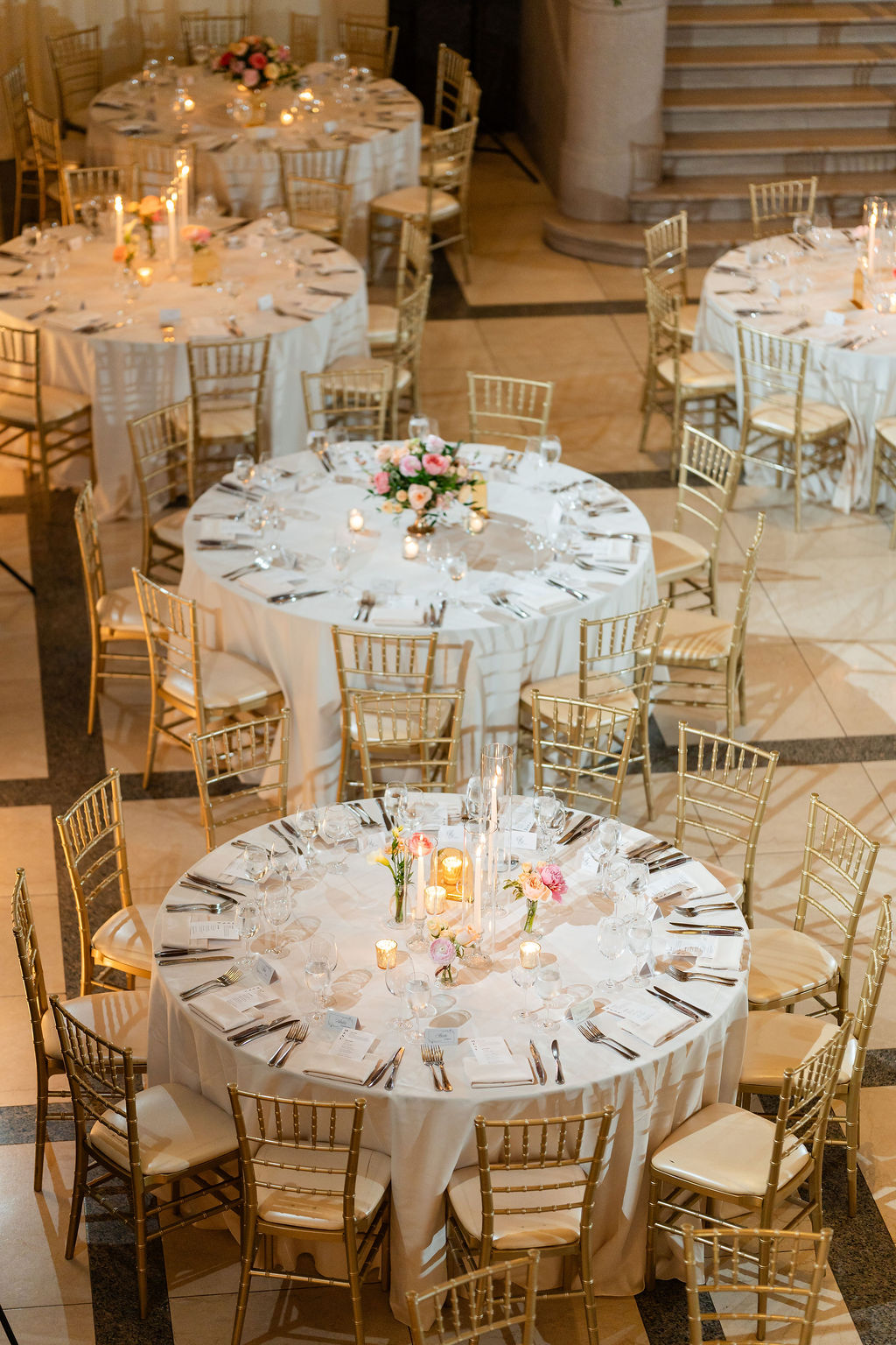a dining table with wine glasses