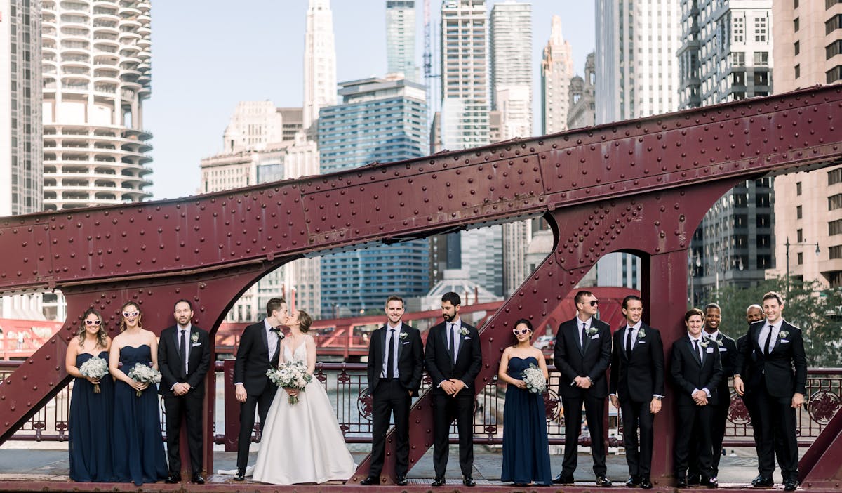 wedding party group shot on the Chicago bridge