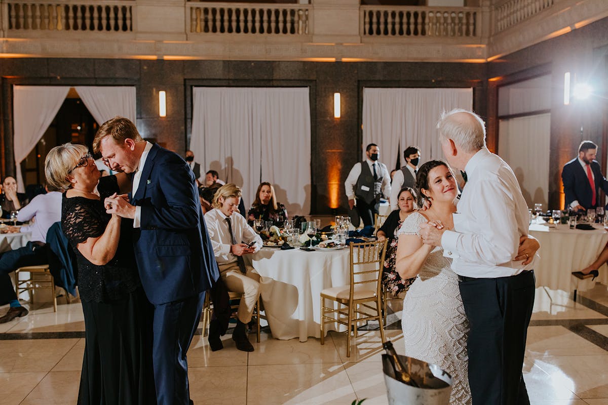 a group of people standing in front of a crowd