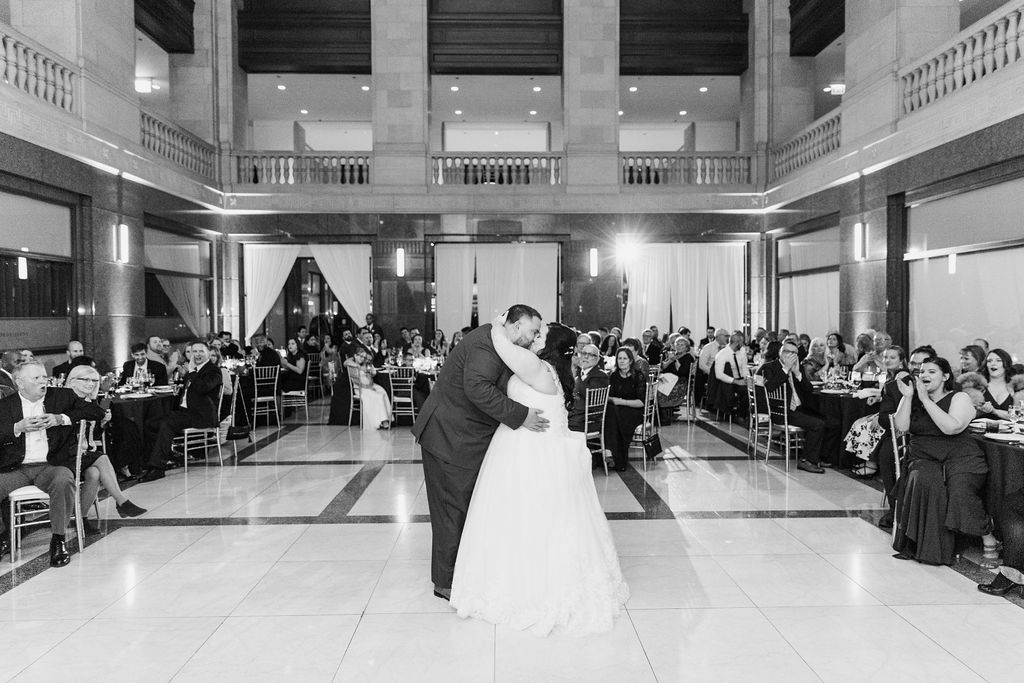 a group of people standing in front of a building
