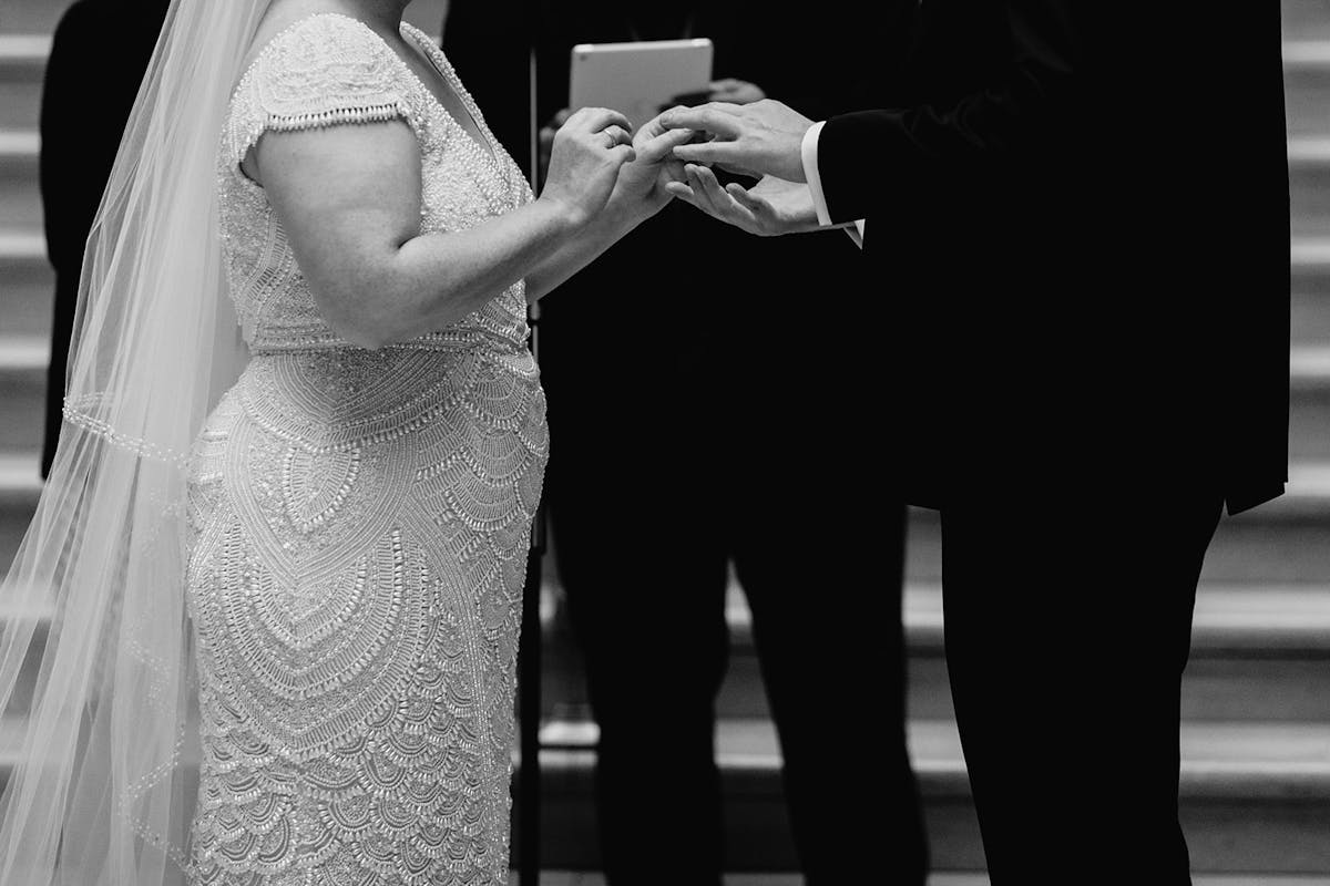 a person standing in front of a mirror posing for the camera