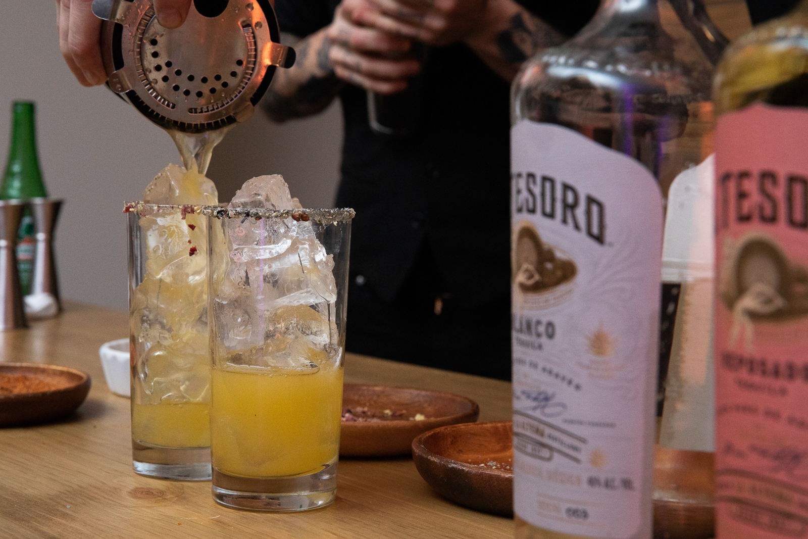 a glass of beer on a table