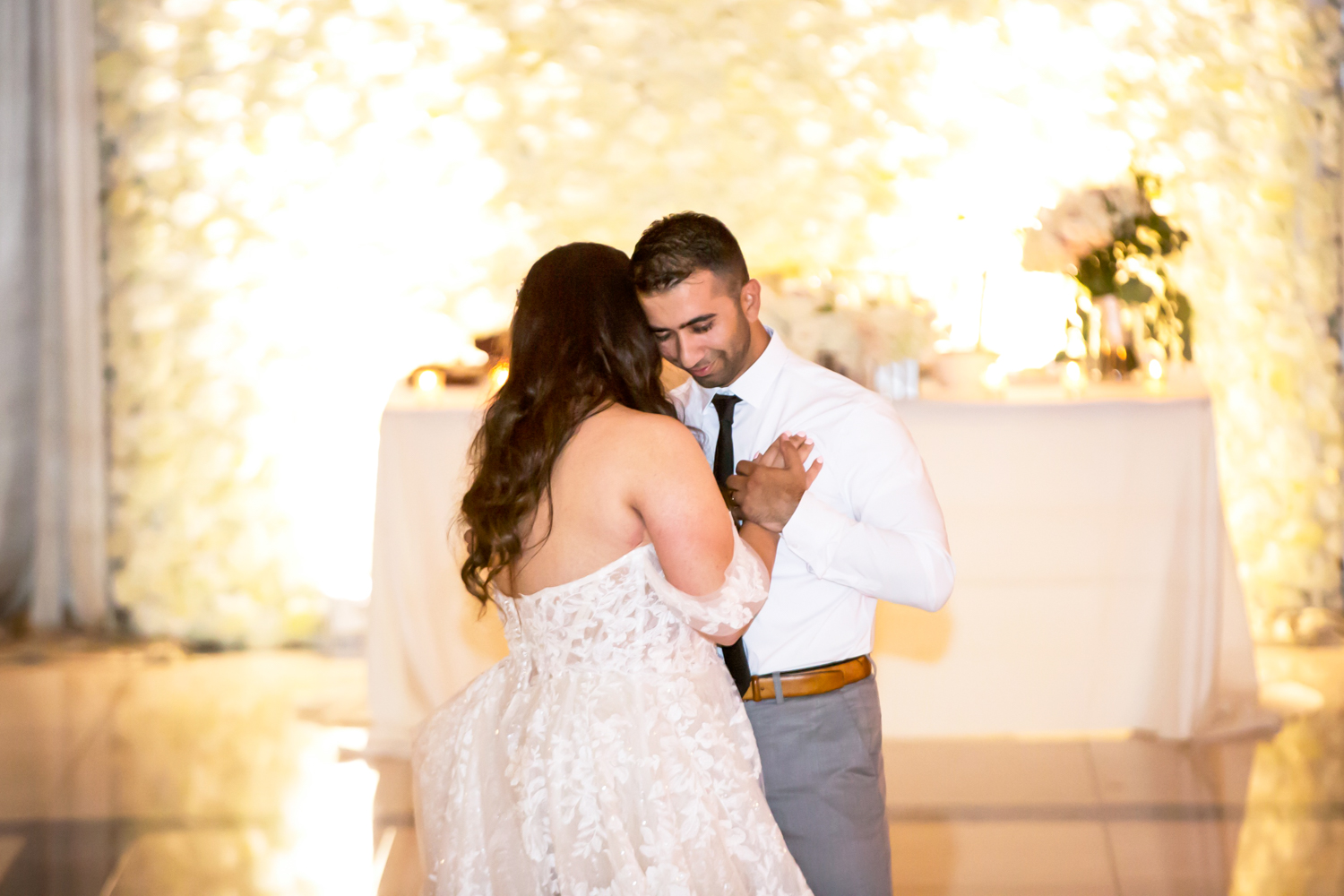a person wearing a dress and standing in a room