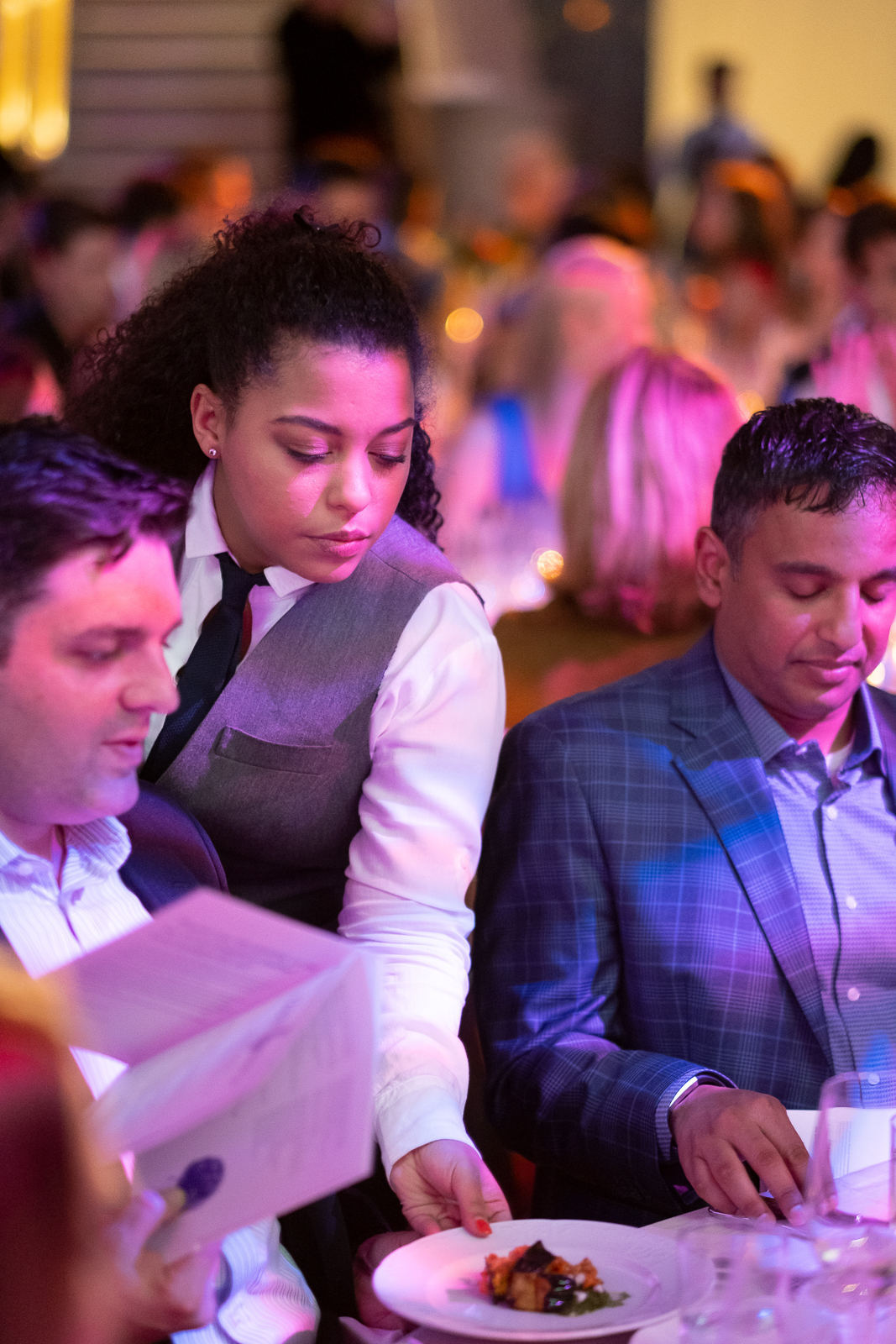 a group of people sitting at a table
