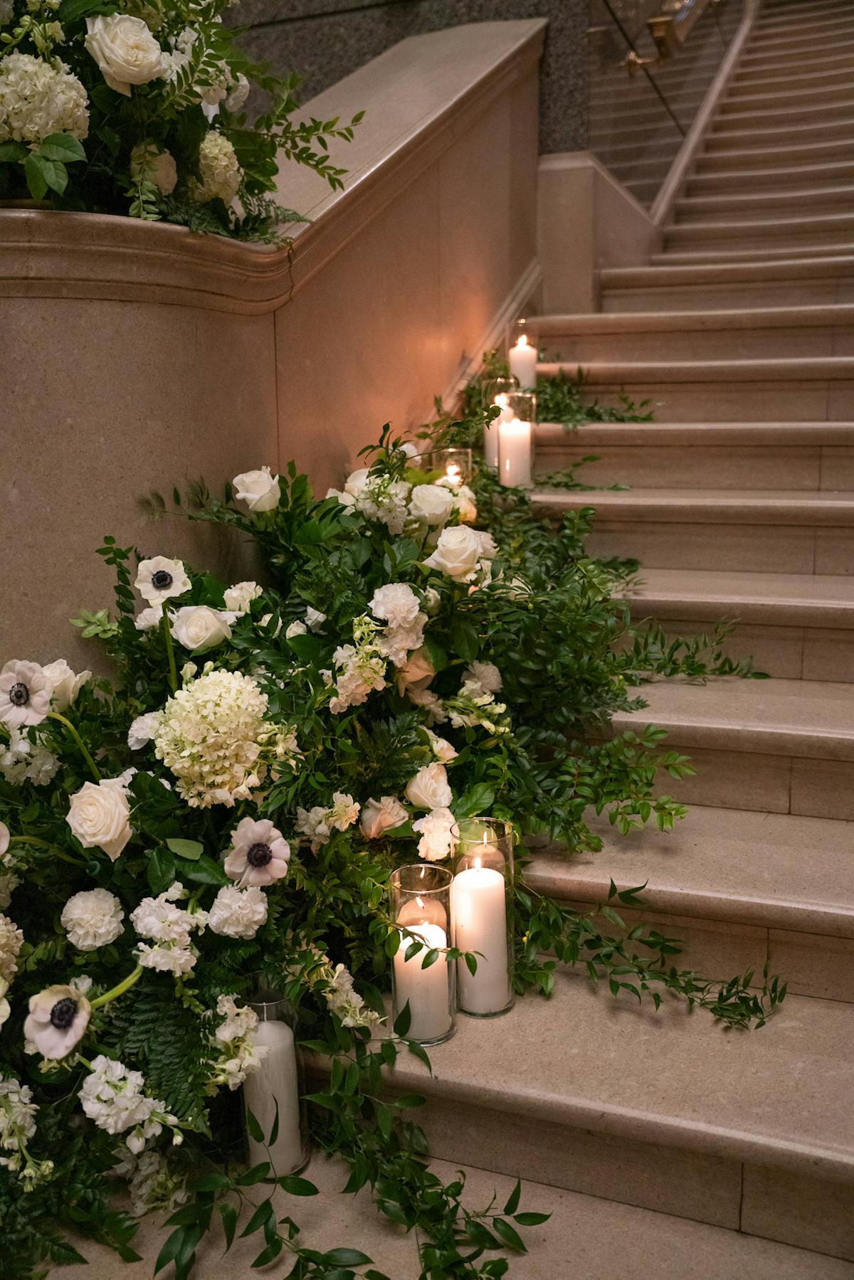 a vase of flowers sitting in a garden