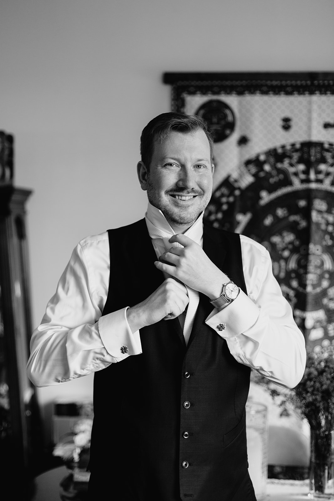 a man wearing a suit and tie