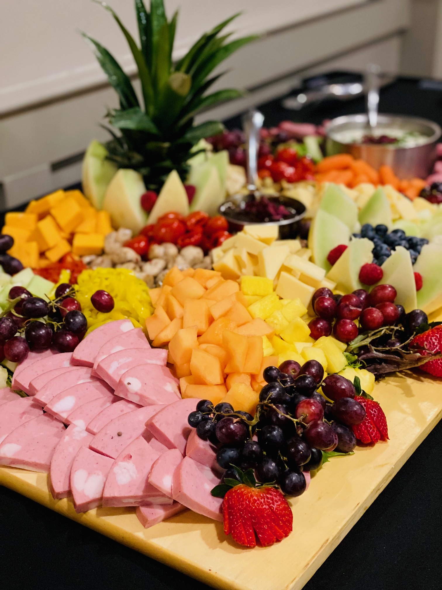 a platter of fruit and meat
