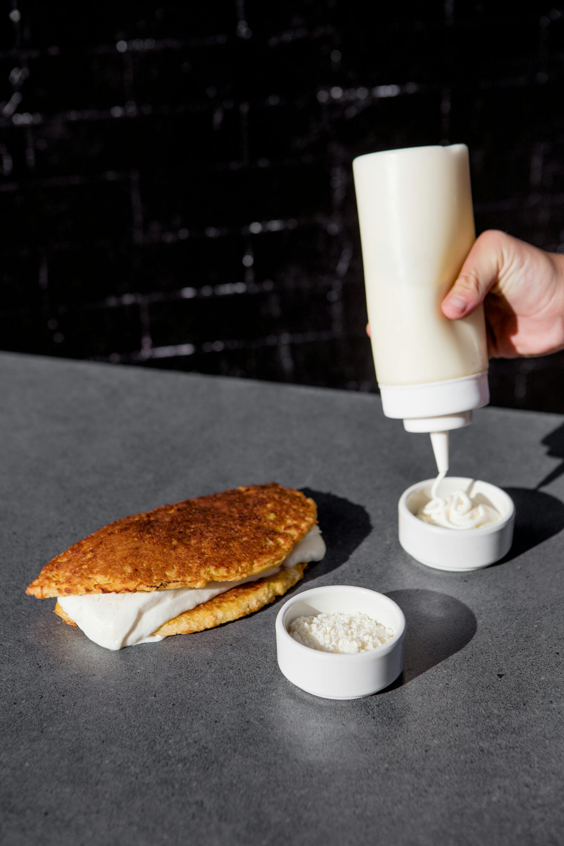 a close up of a plate of food and a cup of coffee