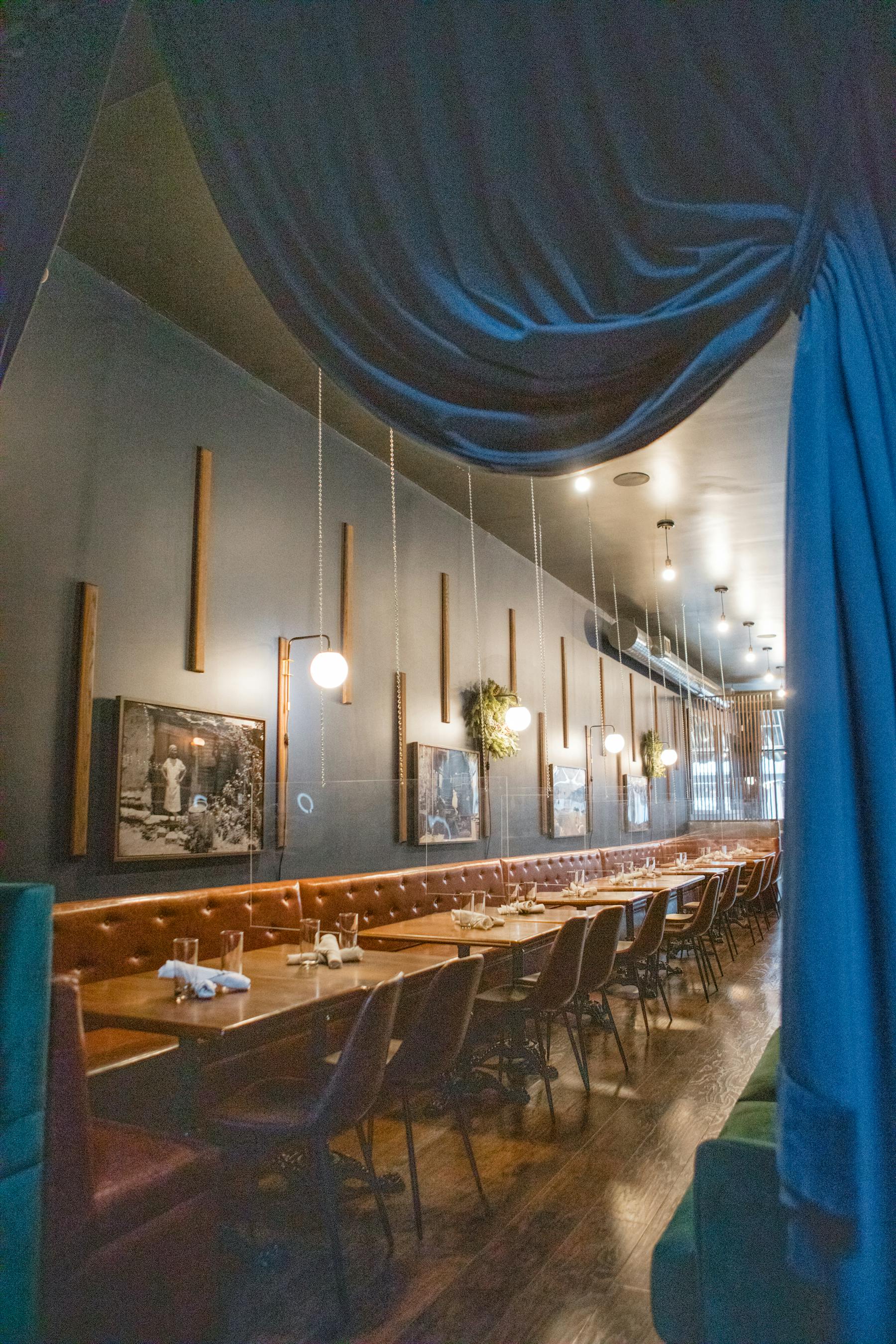 a person standing in front of a mirror posing for the camera