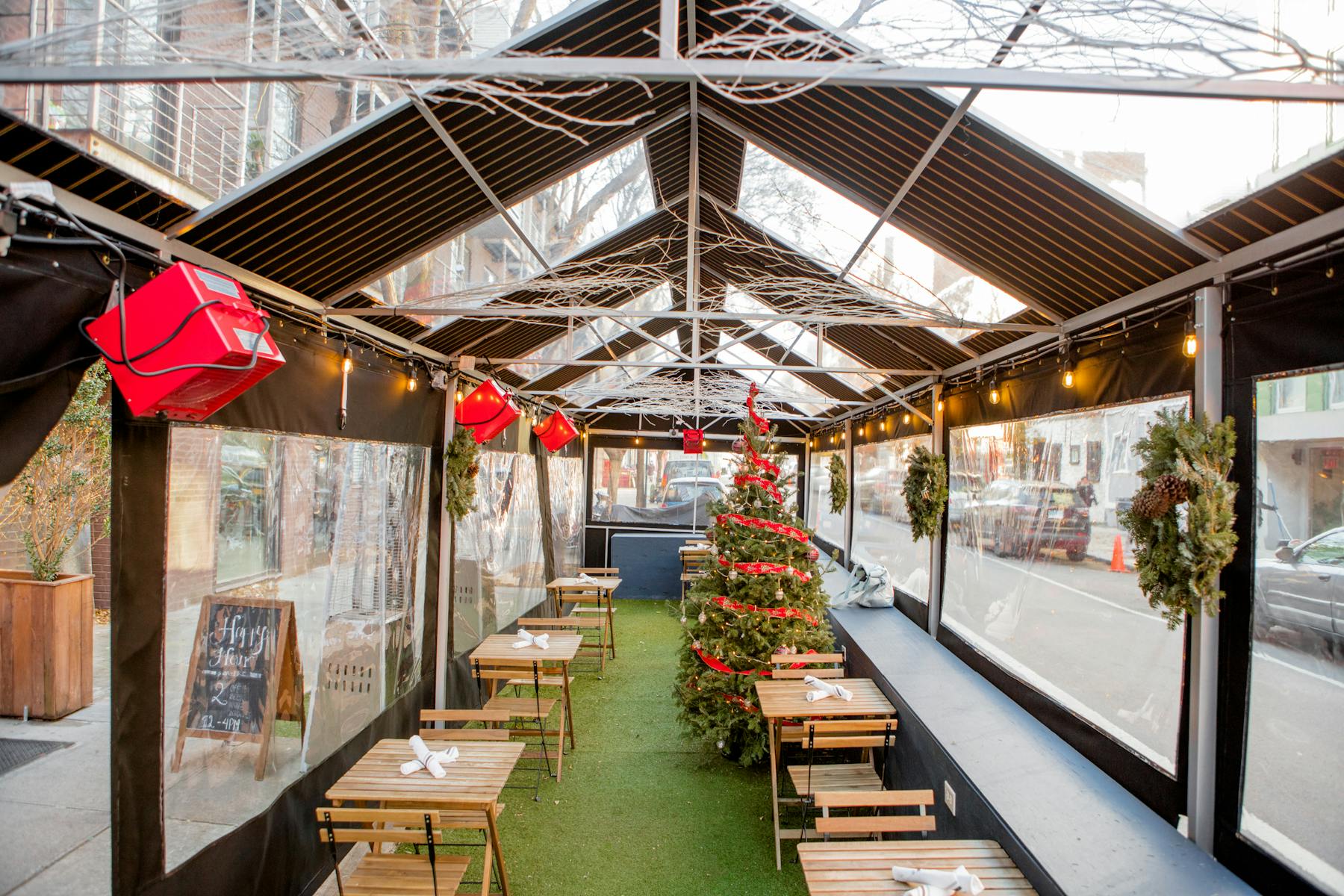 a train is parked on the side of a building