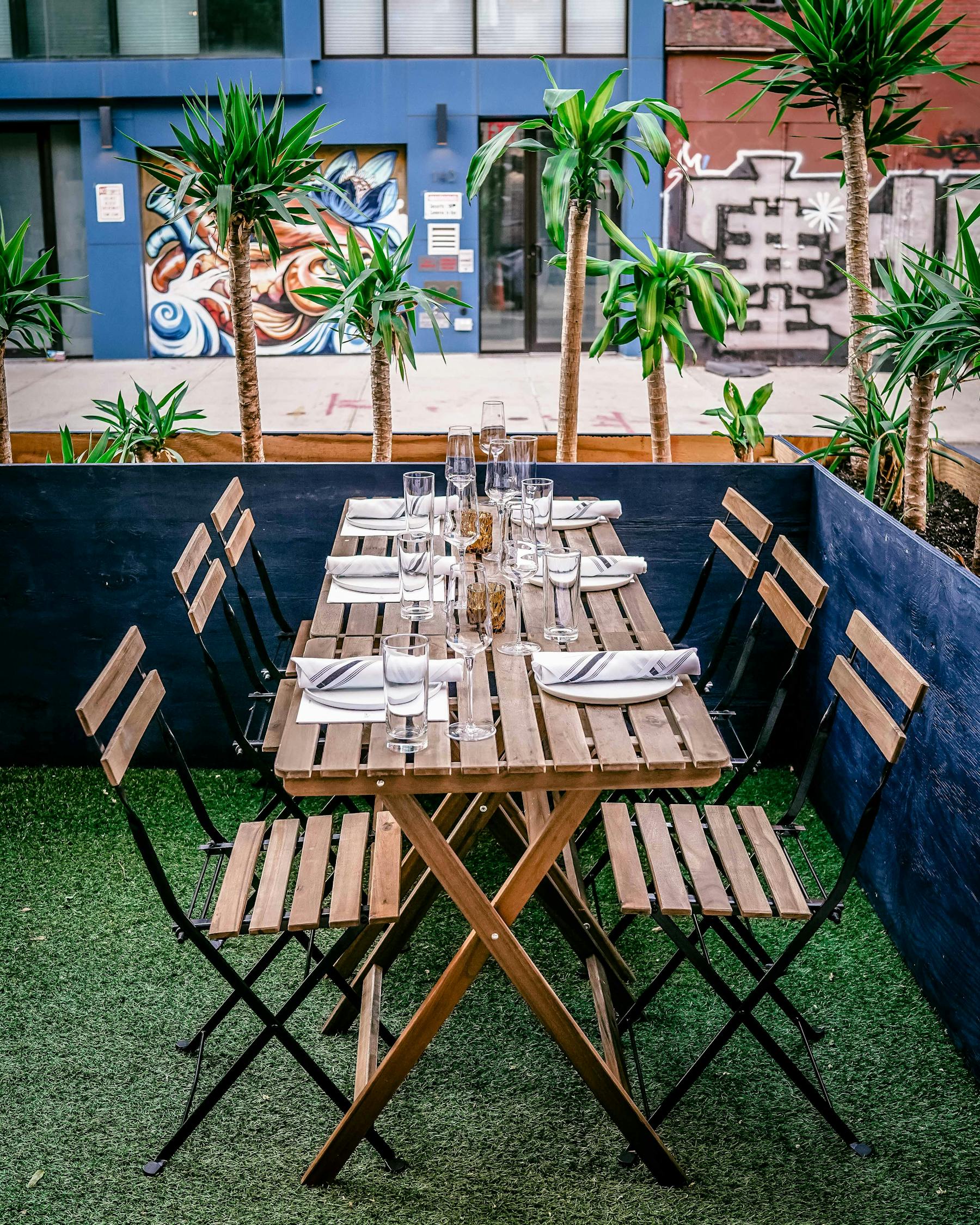 a wooden bench in a garden