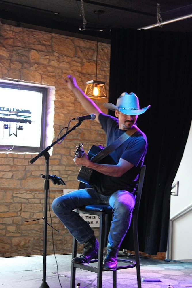a person holding a microphone