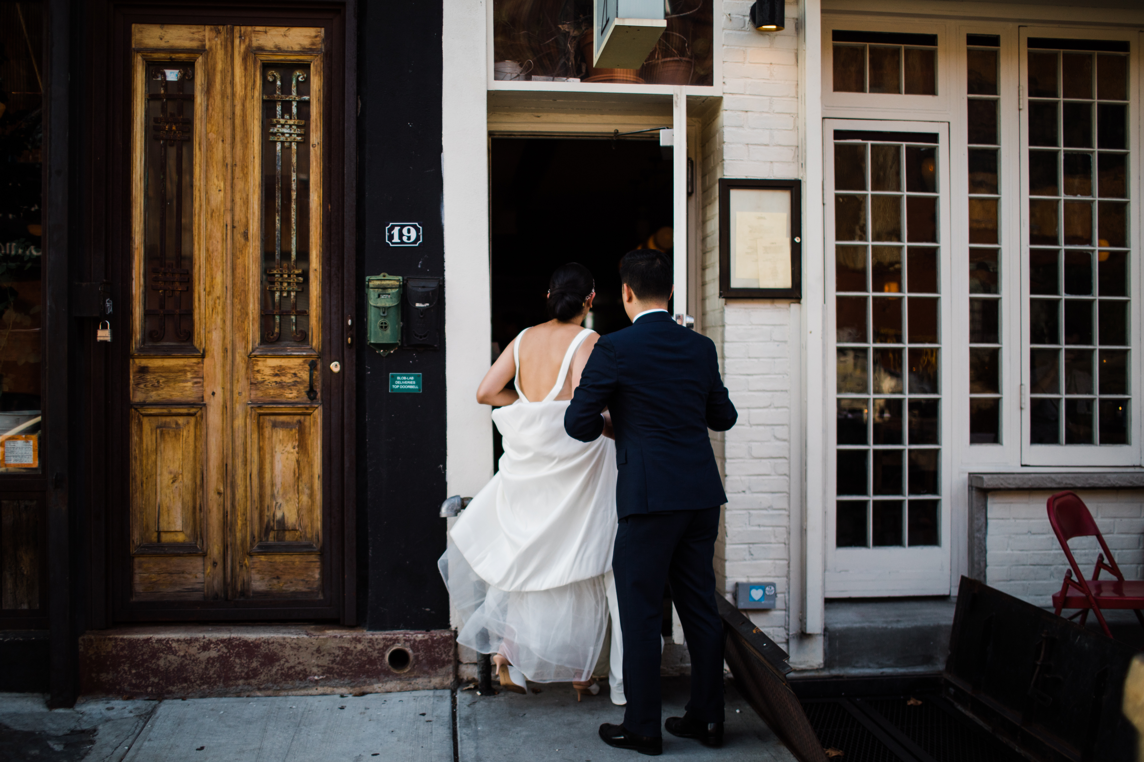 a couple walking into a building
