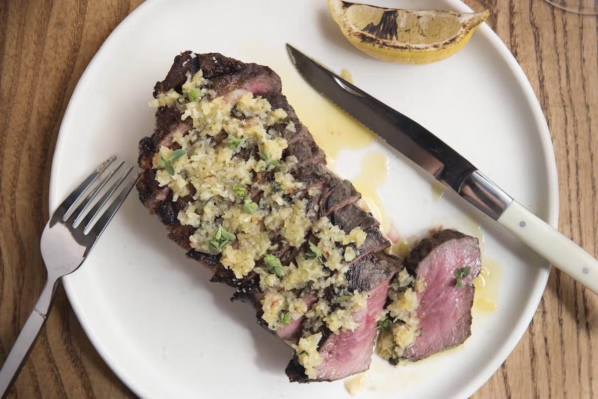 a plate of food with a fork and knife