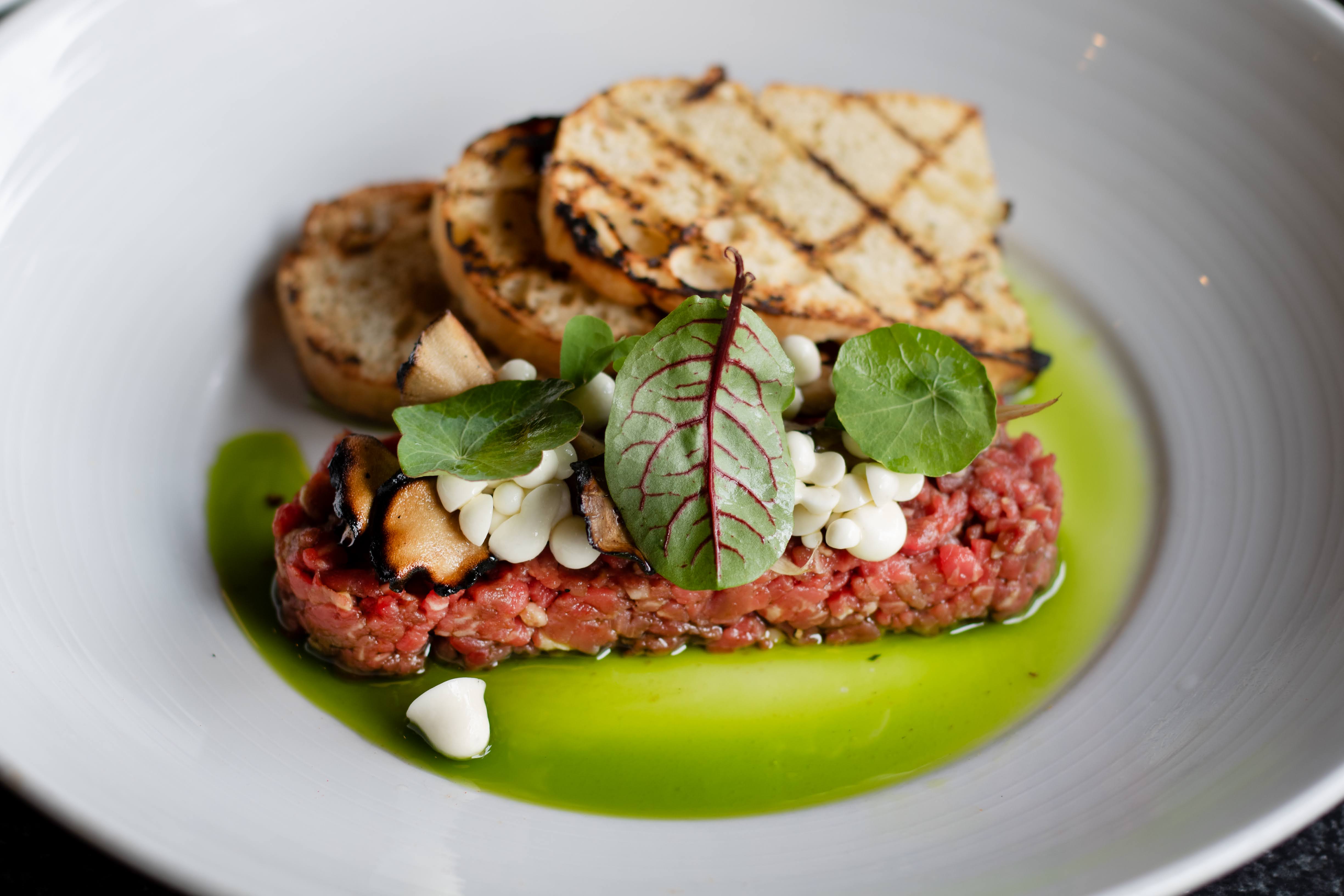 beef, salad and grilled bread